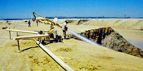 Manual hydraulic monitor on a tailings facility in South Africa